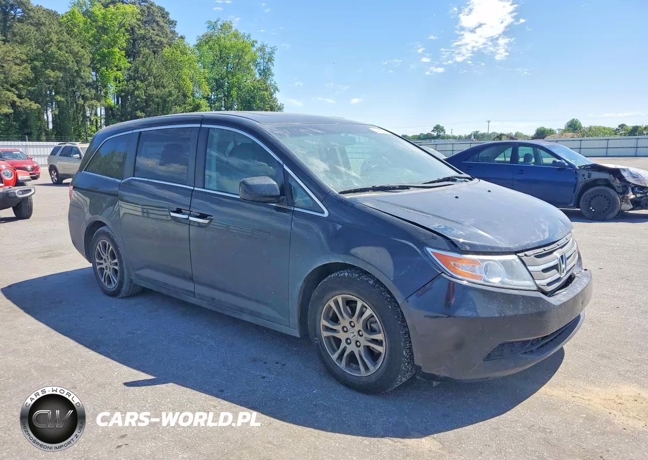 2012 Honda Odyssey Exl VIN:5FNRL5H67CB099975 - 4