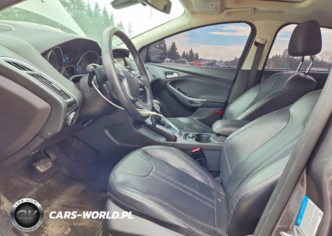 2012 Ford Focus Titanium VIN:1FAHP3J22CL379270 - 7