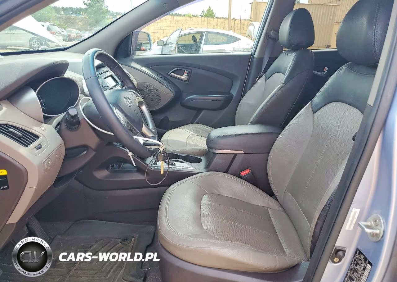 2012 Hyundai Tucson Limited VIN:KM8JU3AC8CU498752 - 7