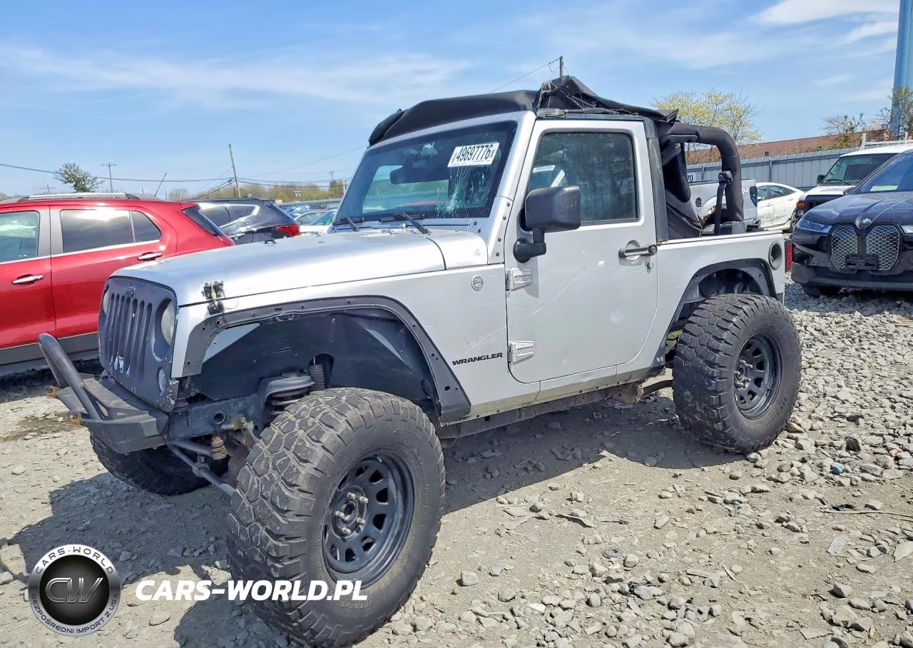 2012 Jeep Wrangler Sahara VIN:1C4AJWBG9CL230072 - 1