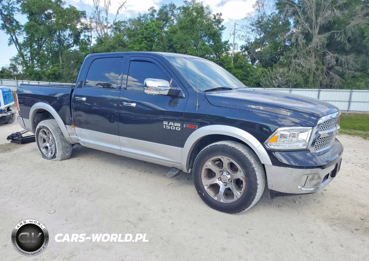 2015 Ram 1500 Laramie VIN:1C6RR6NM7FS715003 - 4
