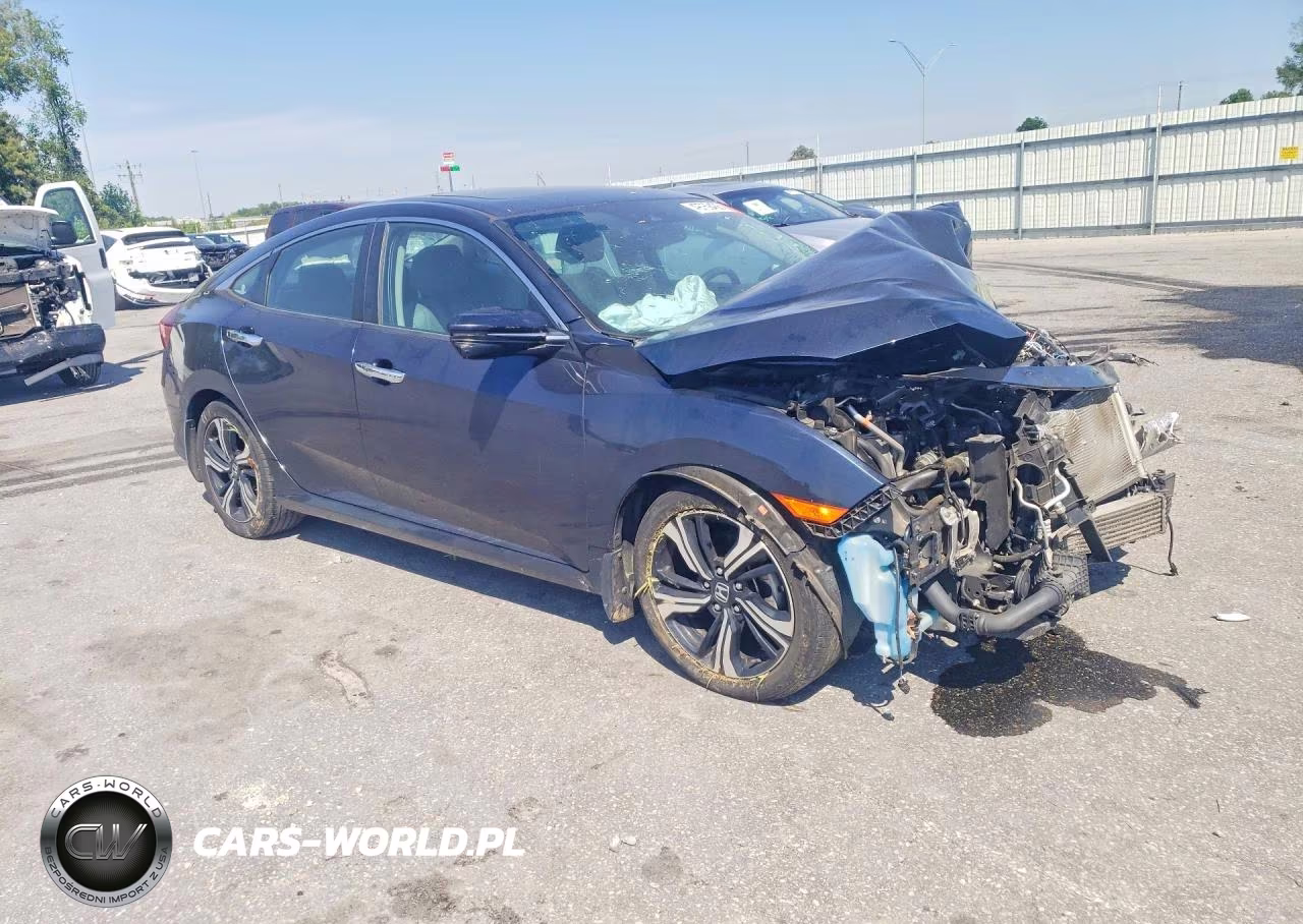 2017 Honda Civic Touring VIN:2HGFC1F95HH633552 - 4