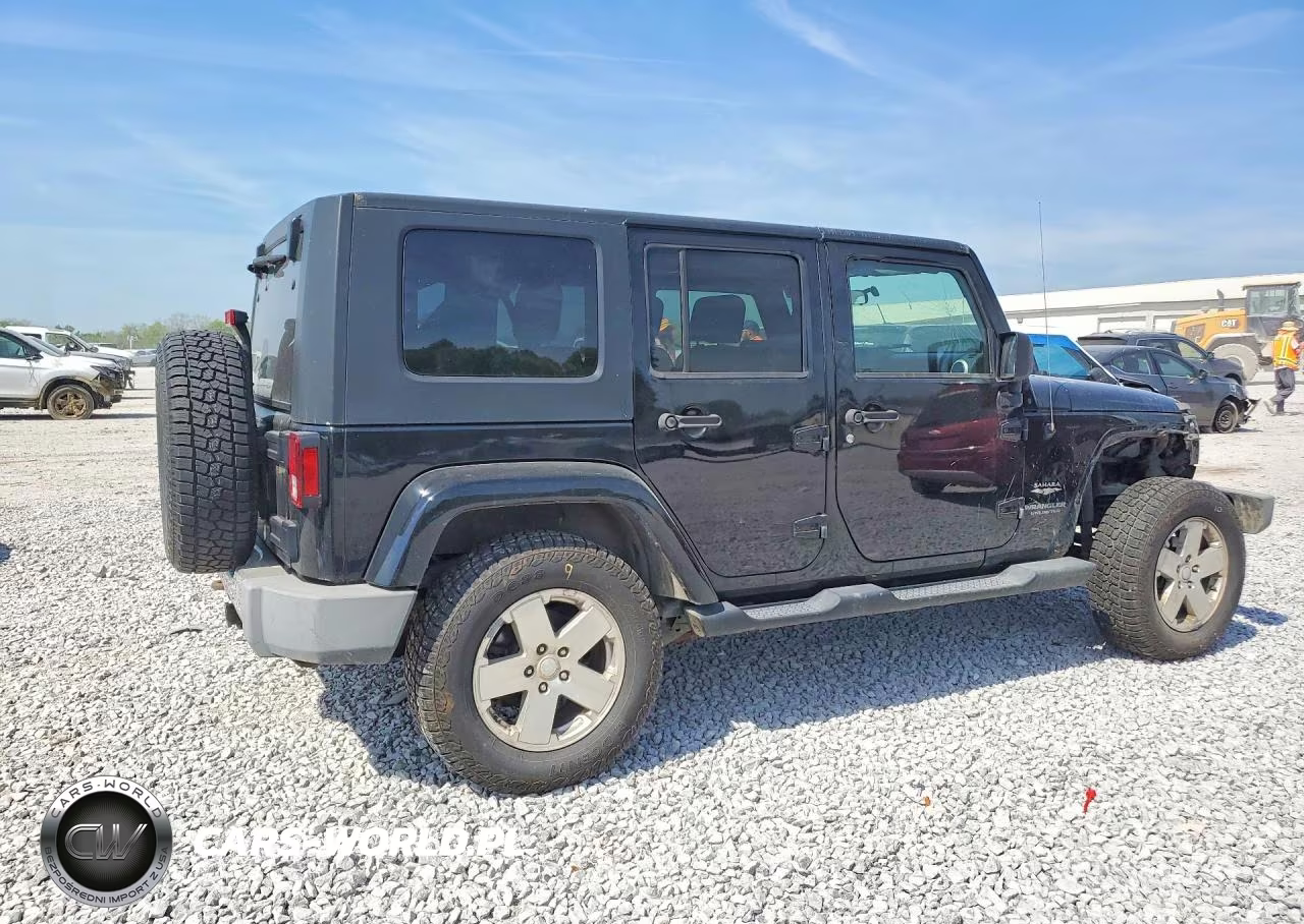 2009 Jeep Wrangler Unlimited Sahara VIN:1J4GA59149L760524 - 3
