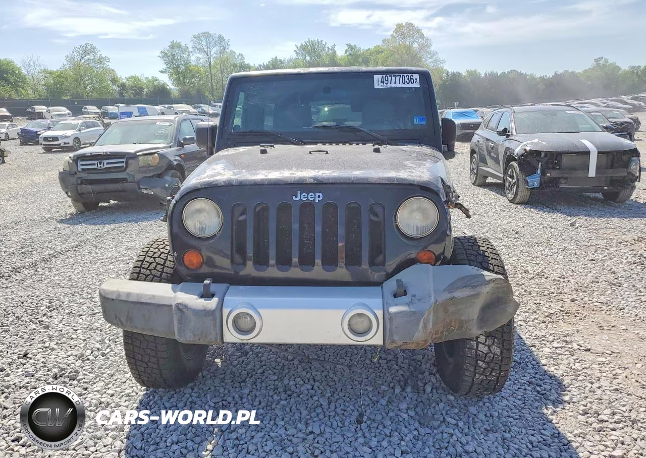 2009 Jeep Wrangler Unlimited Sahara VIN:1J4GA59149L760524 - 5