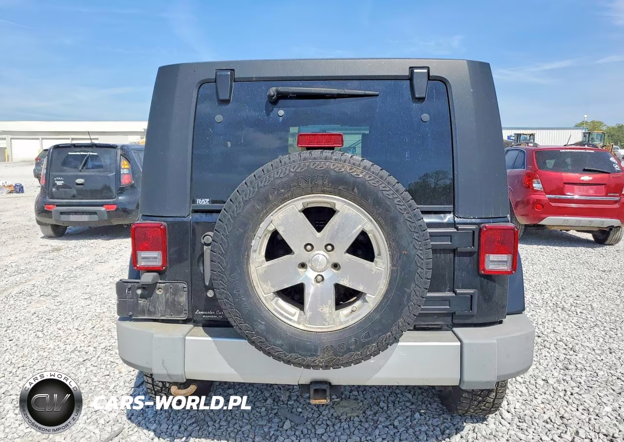 2009 Jeep Wrangler Unlimited Sahara VIN:1J4GA59149L760524 - 6