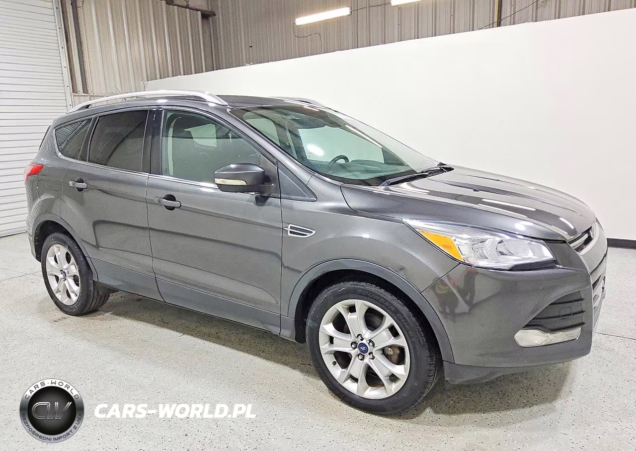 2015 Ford Escape Titanium VIN:1FMCU0JX6FUC34699 - 4