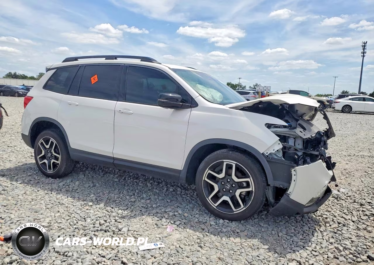 2023 Honda Passport Elite VIN:5FNYF8H03PB034496 - 4