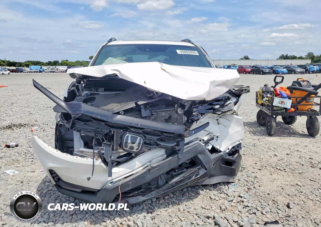 2023 Honda Passport Elite VIN:5FNYF8H03PB034496 - 5