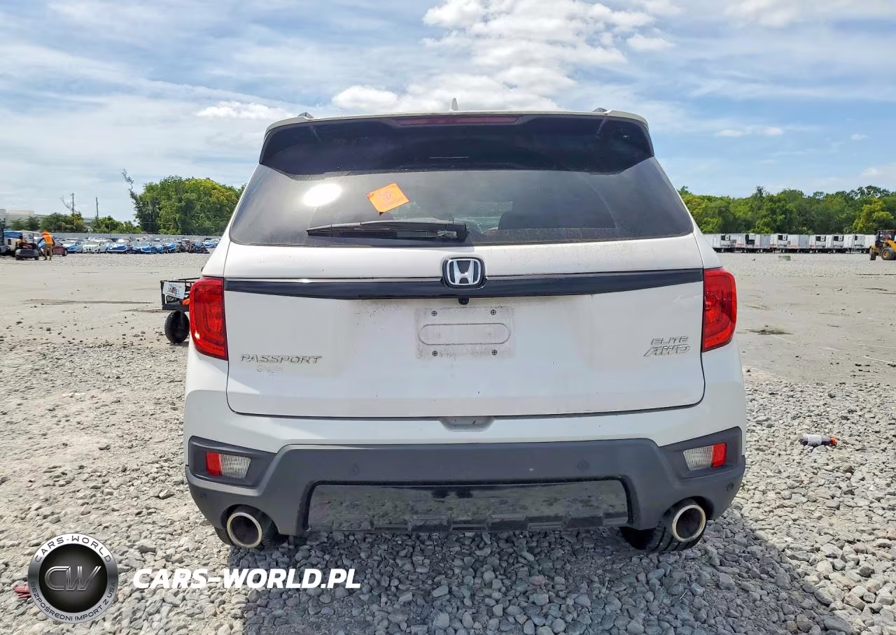 2023 Honda Passport Elite VIN:5FNYF8H03PB034496 - 6
