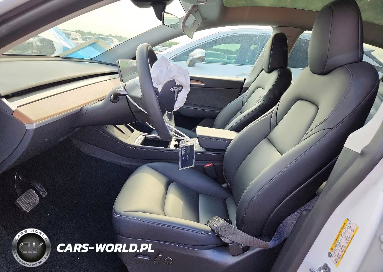 2024 Tesla Model Y VIN:7SAYGDEE3RA333415 - 7