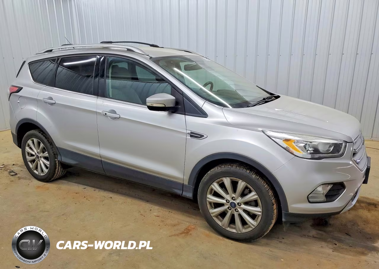 2017 Ford Escape Titanium VIN:1FMCU0J95HUD90611 - 4