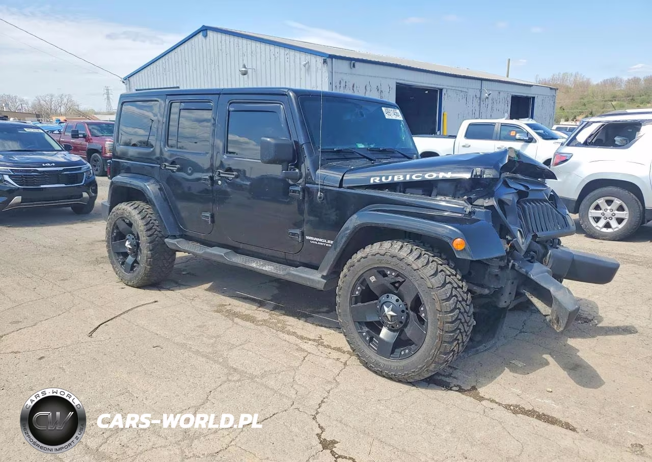 2015 Jeep Wrangler Unlimited Rubicon VIN:1C4HJWFG8FL684052 - 4