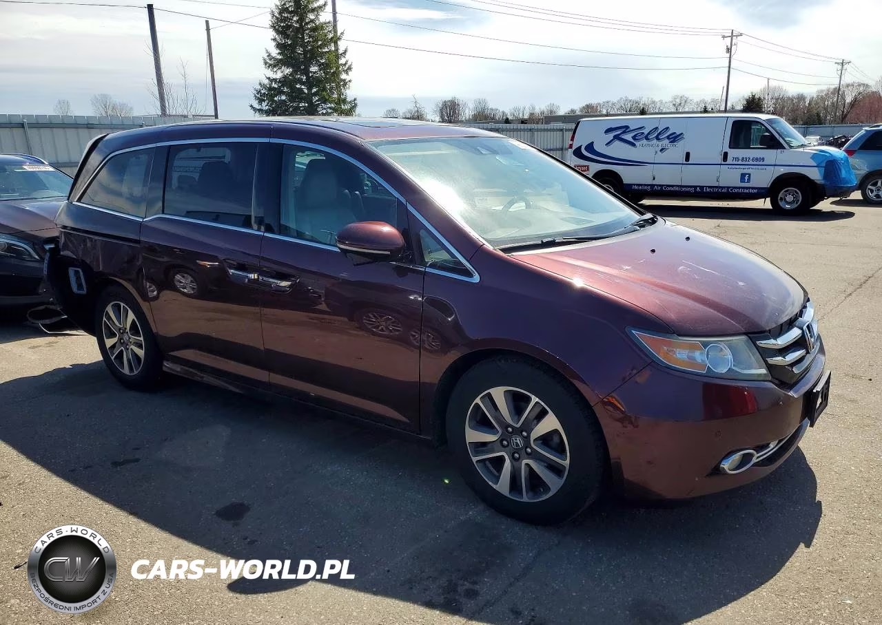 2015 Honda Odyssey Touring VIN:5FNRL5H90FB007698 - 4