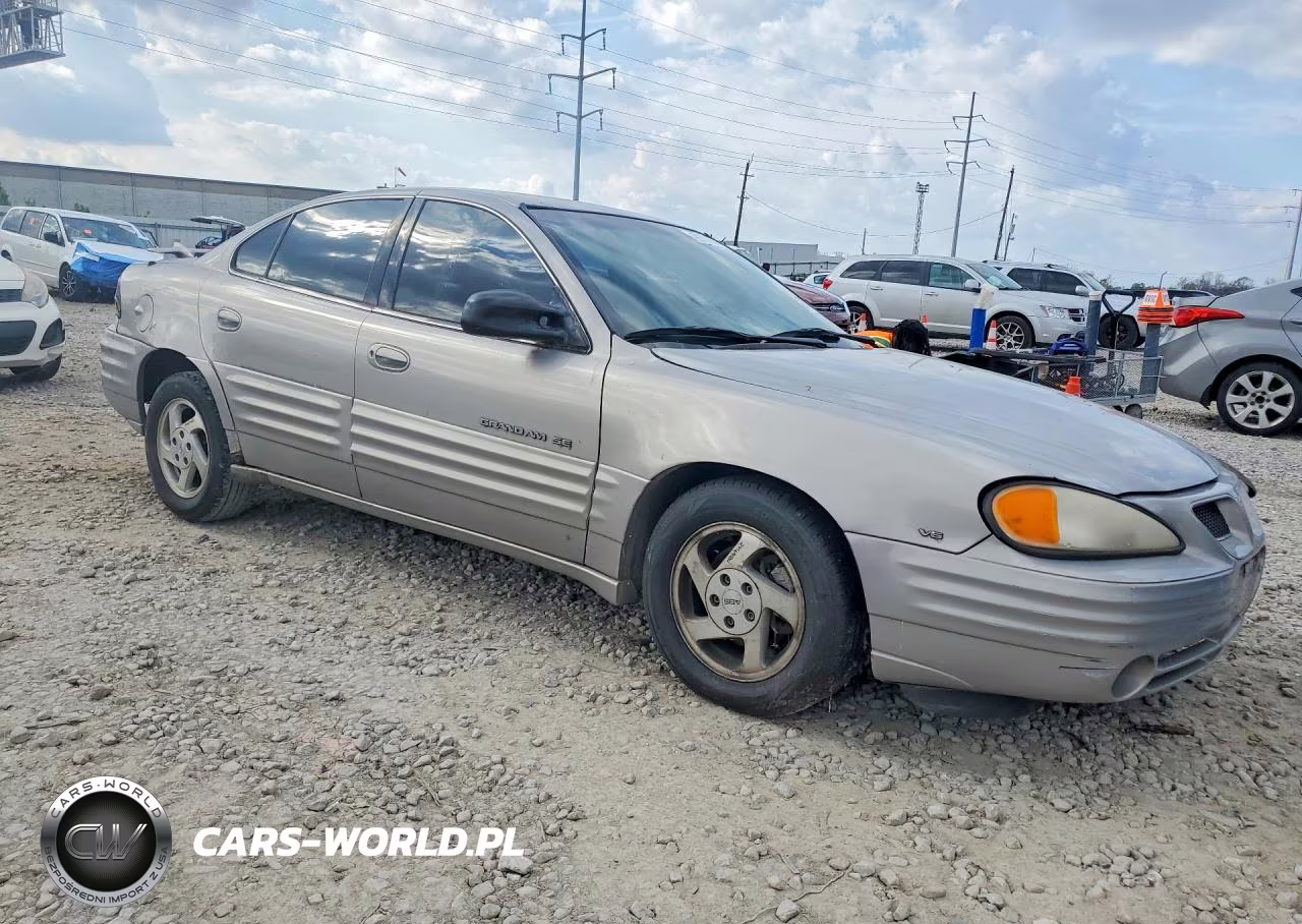 1999 Pontiac Grand Am Se VIN:1G2NE52E3XM738704 - 4
