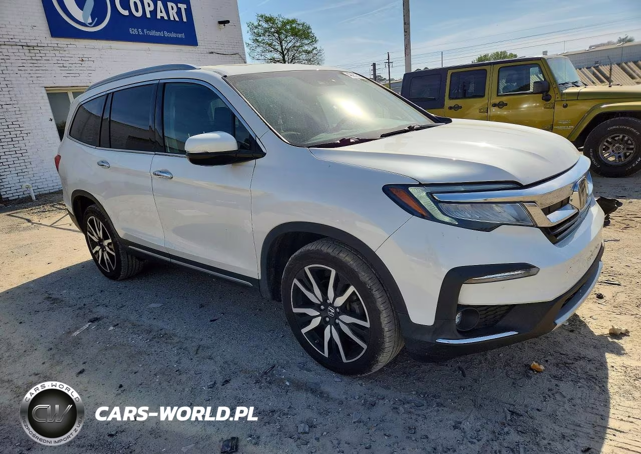 2022 Honda Pilot Touring VIN:5FNYF6H61NB005035 - 4