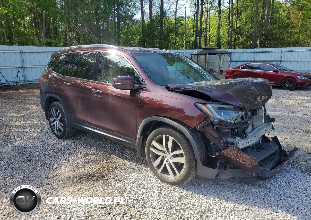 2017 Honda Pilot Elite VIN:5FNYF6H06HB006911 - 4