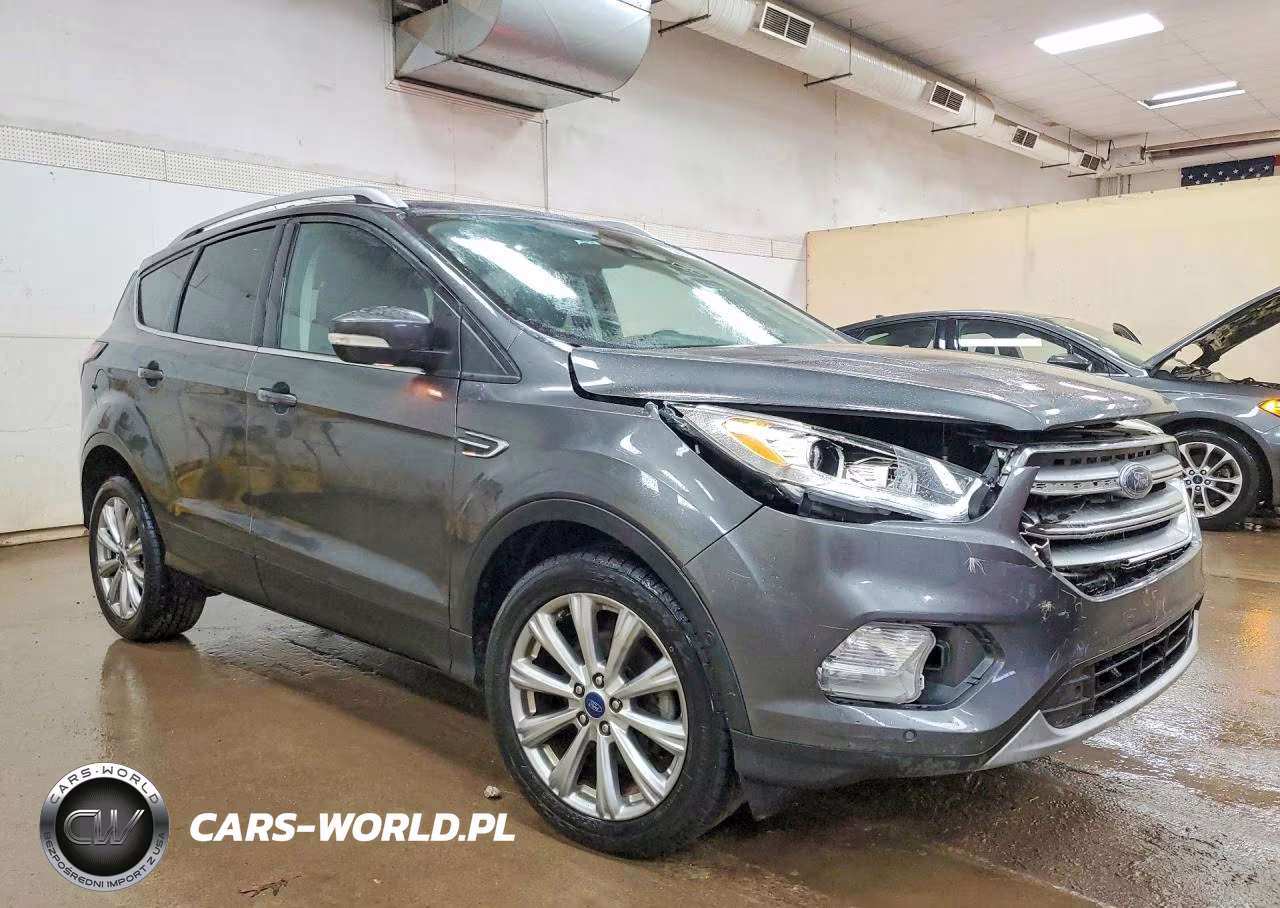 2017 Ford Escape Titanium VIN:1FMCU0JD8HUE57349 - 4