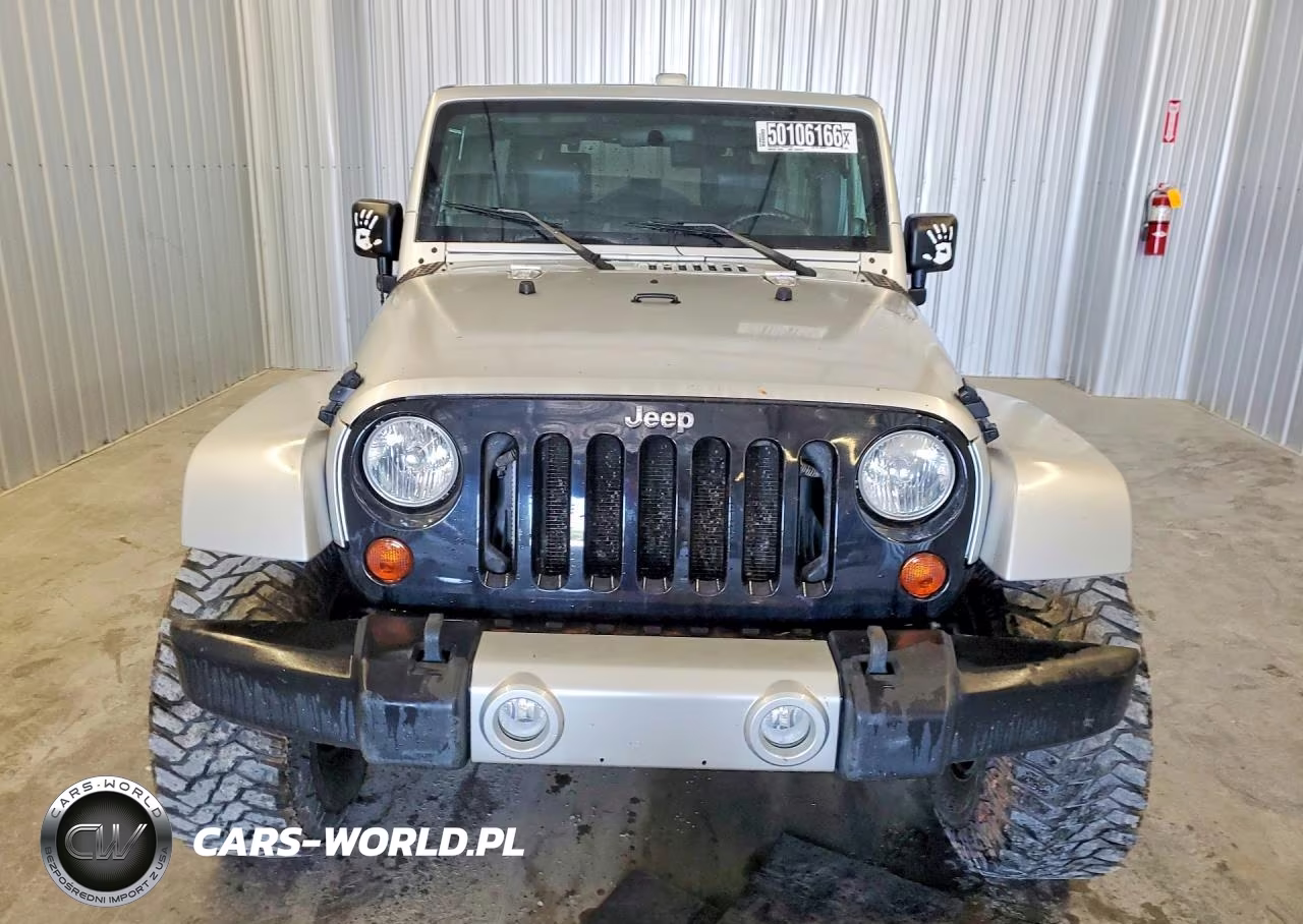 2009 Jeep Wrangler Unlimited Sahara VIN:1J4GA591X9L753724 - 5