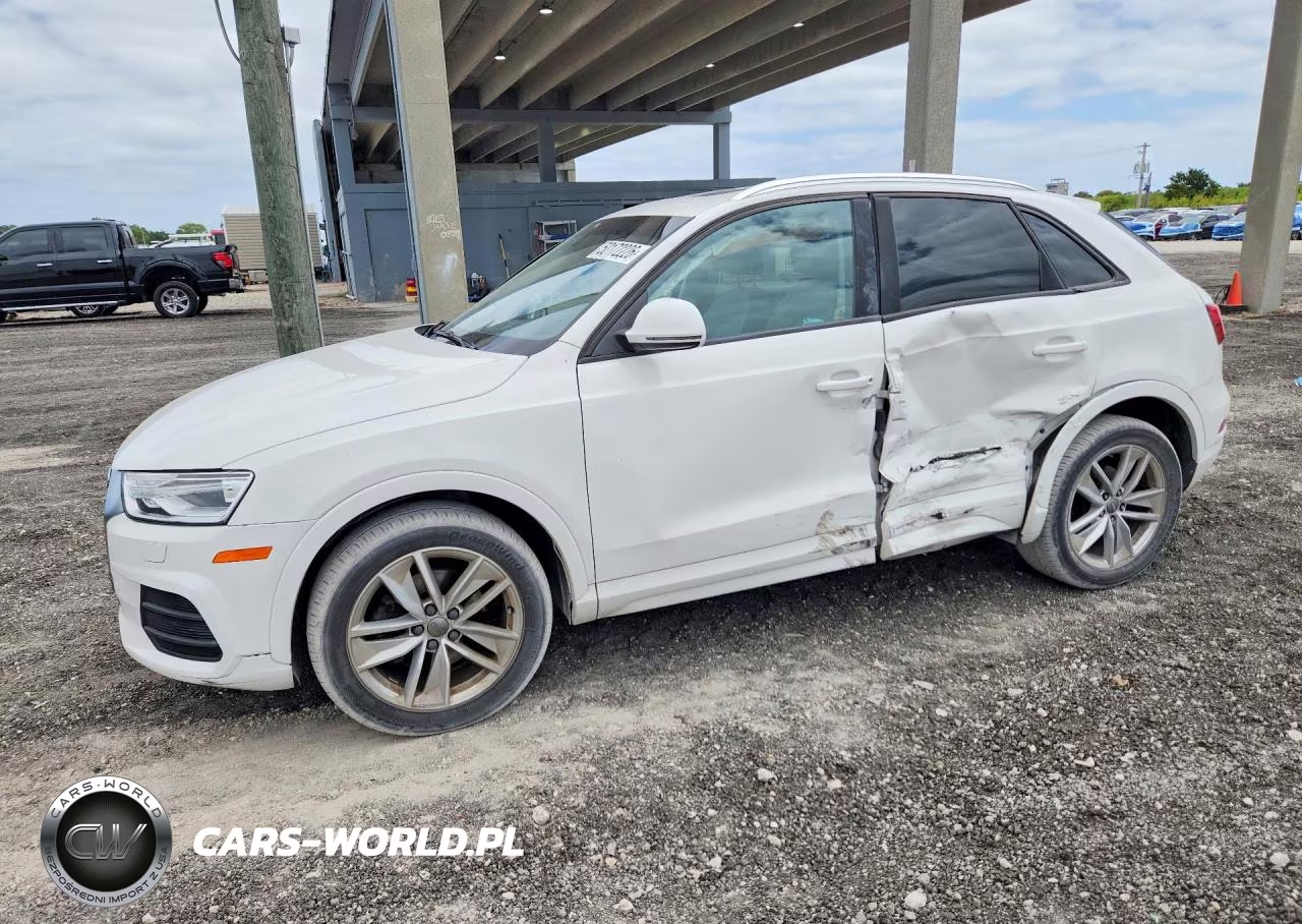 2017 Audi Q3 Premium VIN:WA1BCCFS4HR015418 - 1