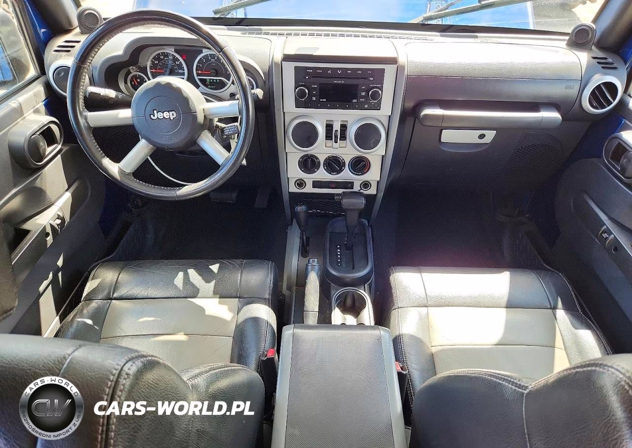 2009 Jeep Wrangler Unlimited Sahara VIN:1J8GA59199L715254 - 8