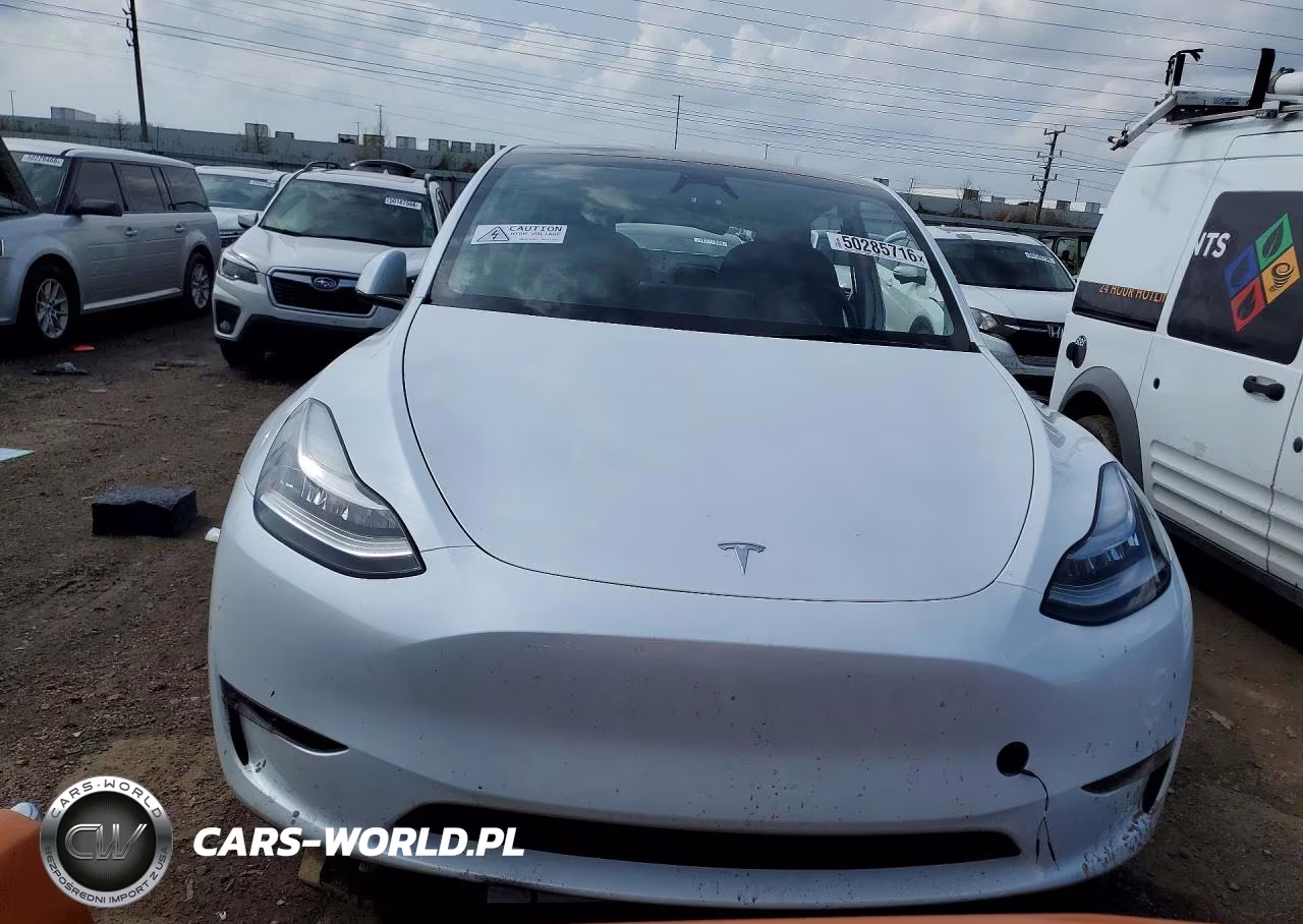 2023 Tesla Model Y VIN:7SAYGDEE0PA138949 - 5