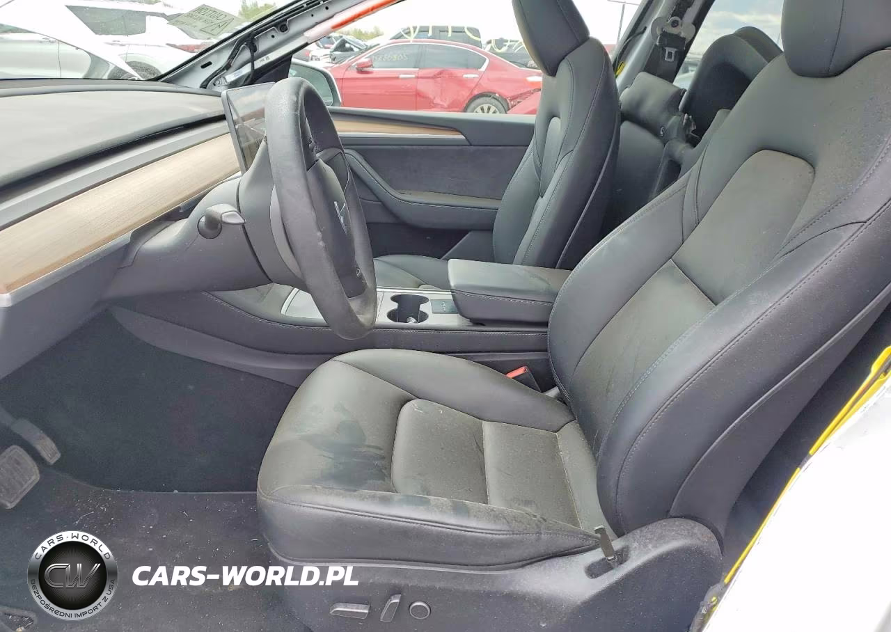 2023 Tesla Model Y VIN:7SAYGDEE0PA138949 - 7