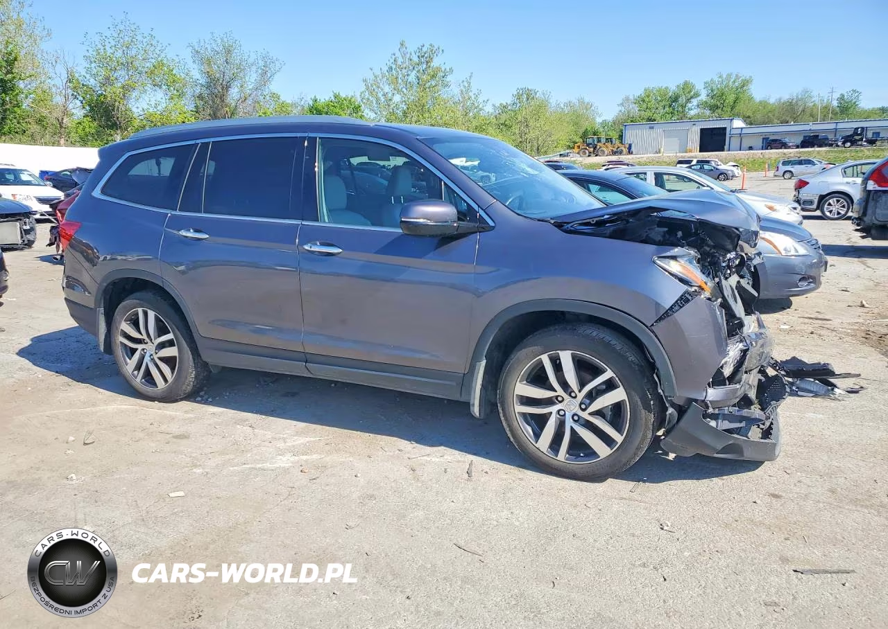 2018 Honda Pilot Elite VIN:5FNYF6H07JB045187 - 4