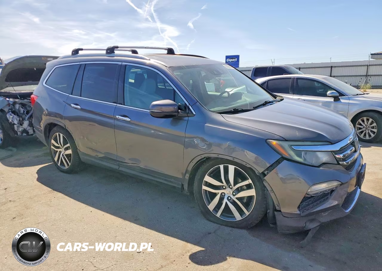 2016 Honda Pilot Elite VIN:5FNYF6H03GB089860 - 4