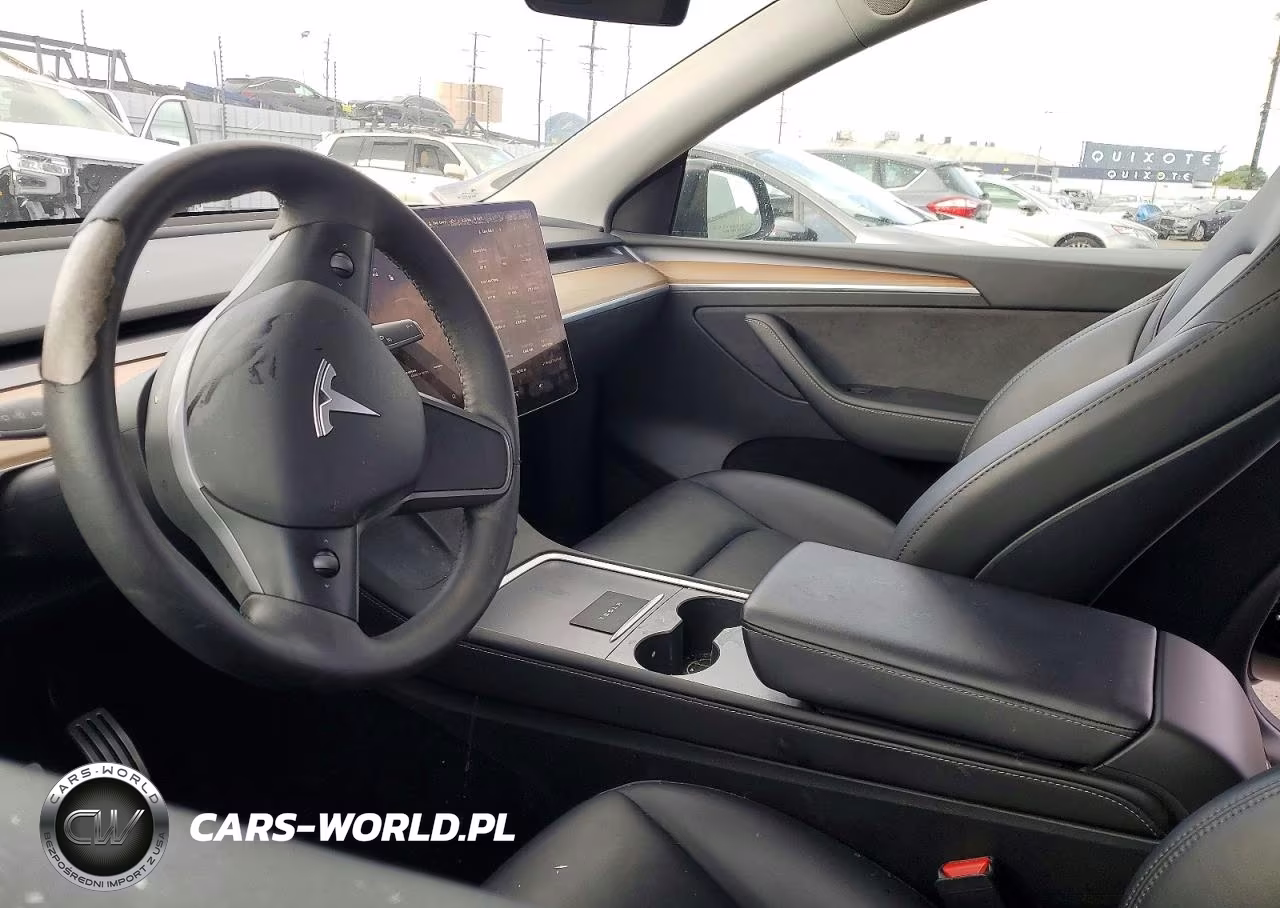 2023 Tesla Model Y VIN:7SAYGDEF8PF769847 - 7