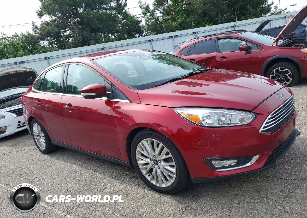 2017 Ford Focus Titanium VIN:1FADP3J27HL257297 - 4