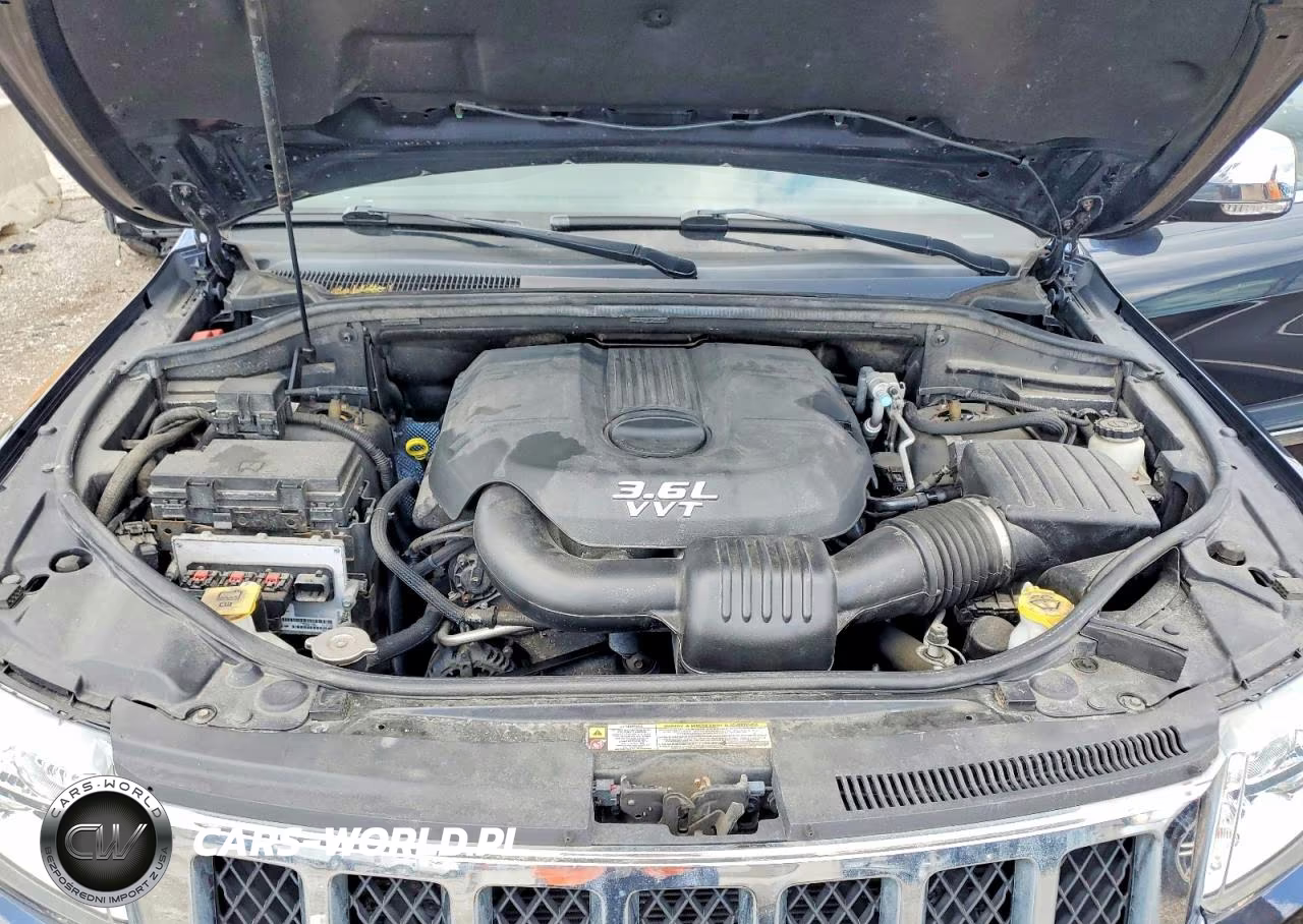 2012 Jeep Grand Cherokee Overland VIN:1C4RJFCG7CC352057 - 11