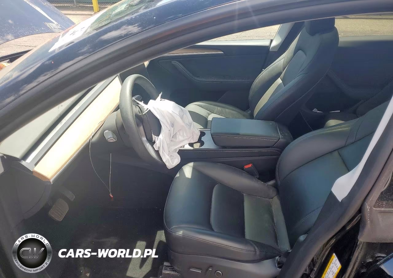 2023 Tesla Model Y VIN:7SAYGDEE9PA187714 - 7