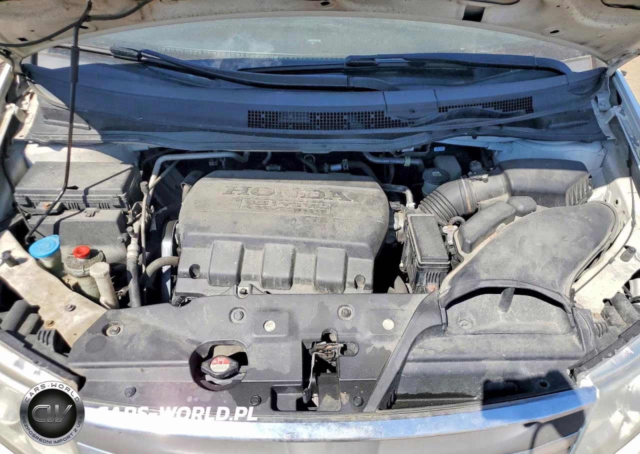 2012 Honda Odyssey Touring VIN:5FNRL5H9XCB057455 - 11