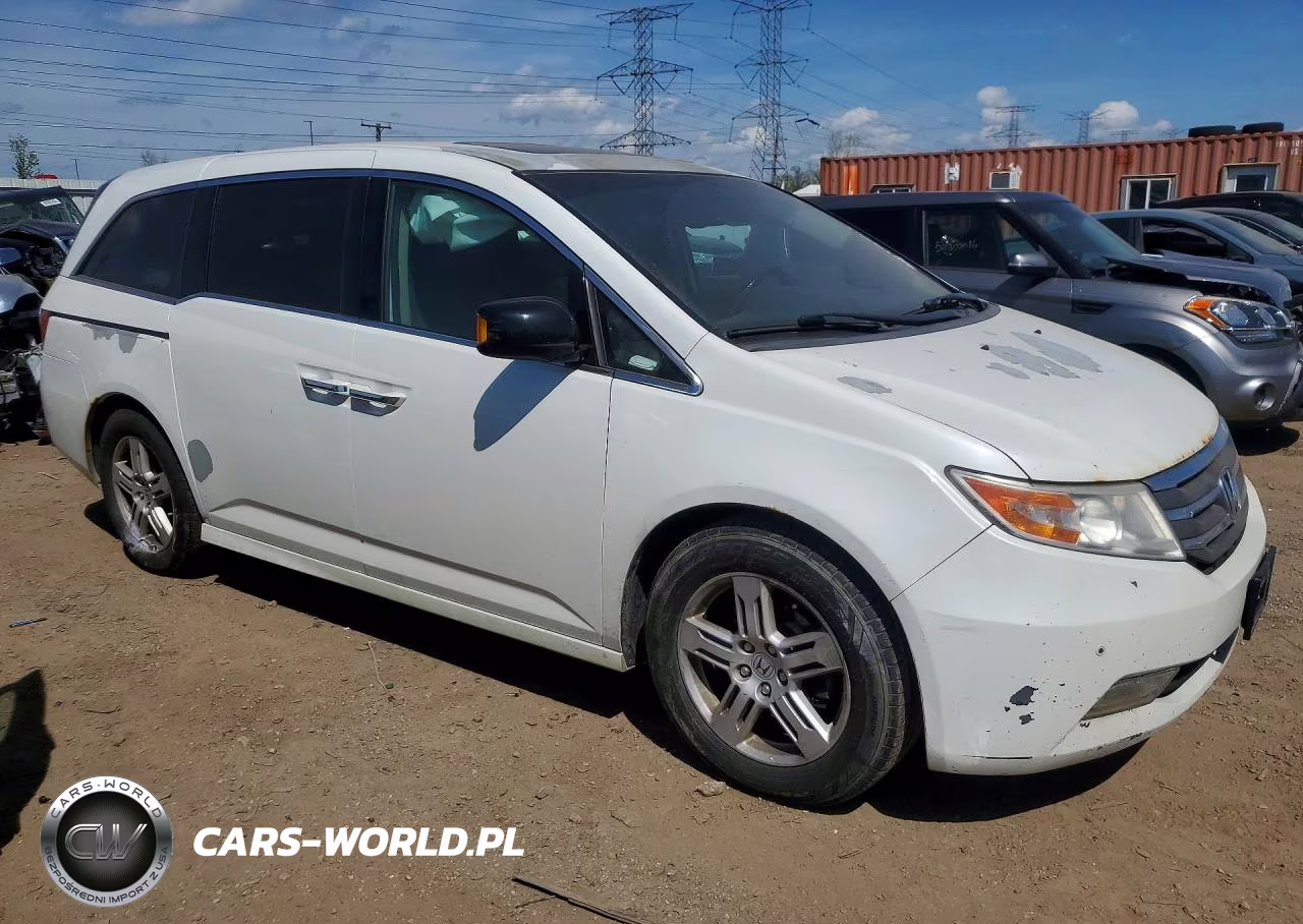 2012 Honda Odyssey Touring VIN:5FNRL5H9XCB057455 - 4