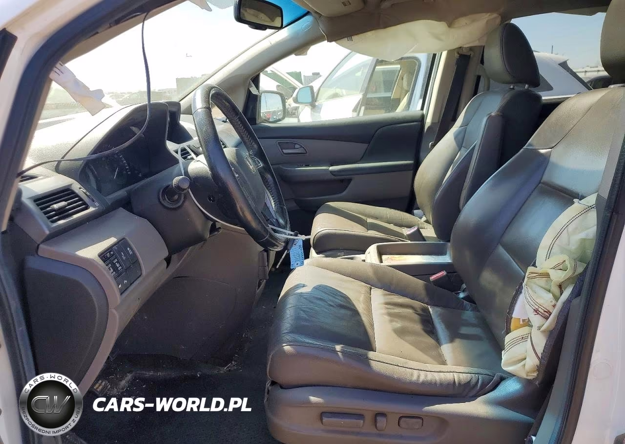 2012 Honda Odyssey Touring VIN:5FNRL5H9XCB057455 - 7