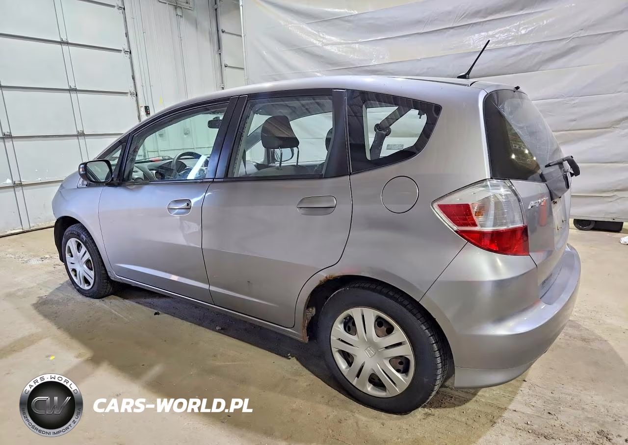 2009 Honda Fit VIN:JHMGE87269S072651 - 2