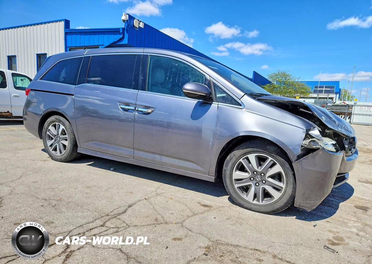 2014 Honda Odyssey Touring VIN:5FNRL5H97EB041894 - 4