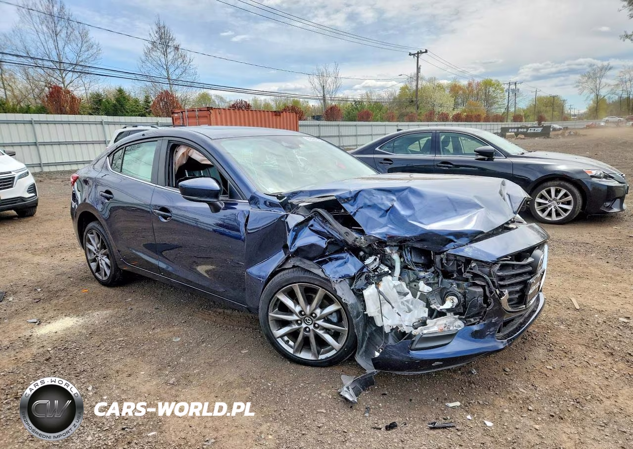2018 Mazda 3 Touring VIN:3MZBN1V33JM256552 - 4