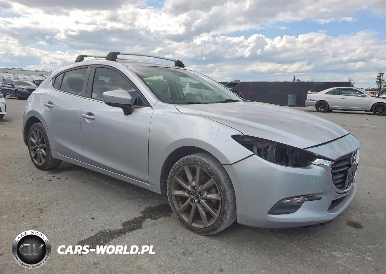 2018 Mazda 3 Touring VIN:3MZBN1L30JM201916 - 4