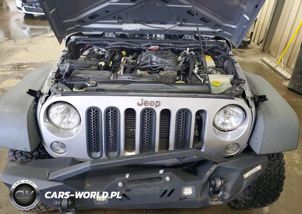 2015 Jeep Wrangler Unlimited Sport VIN:1C4HJWDG9FL664900 - 11