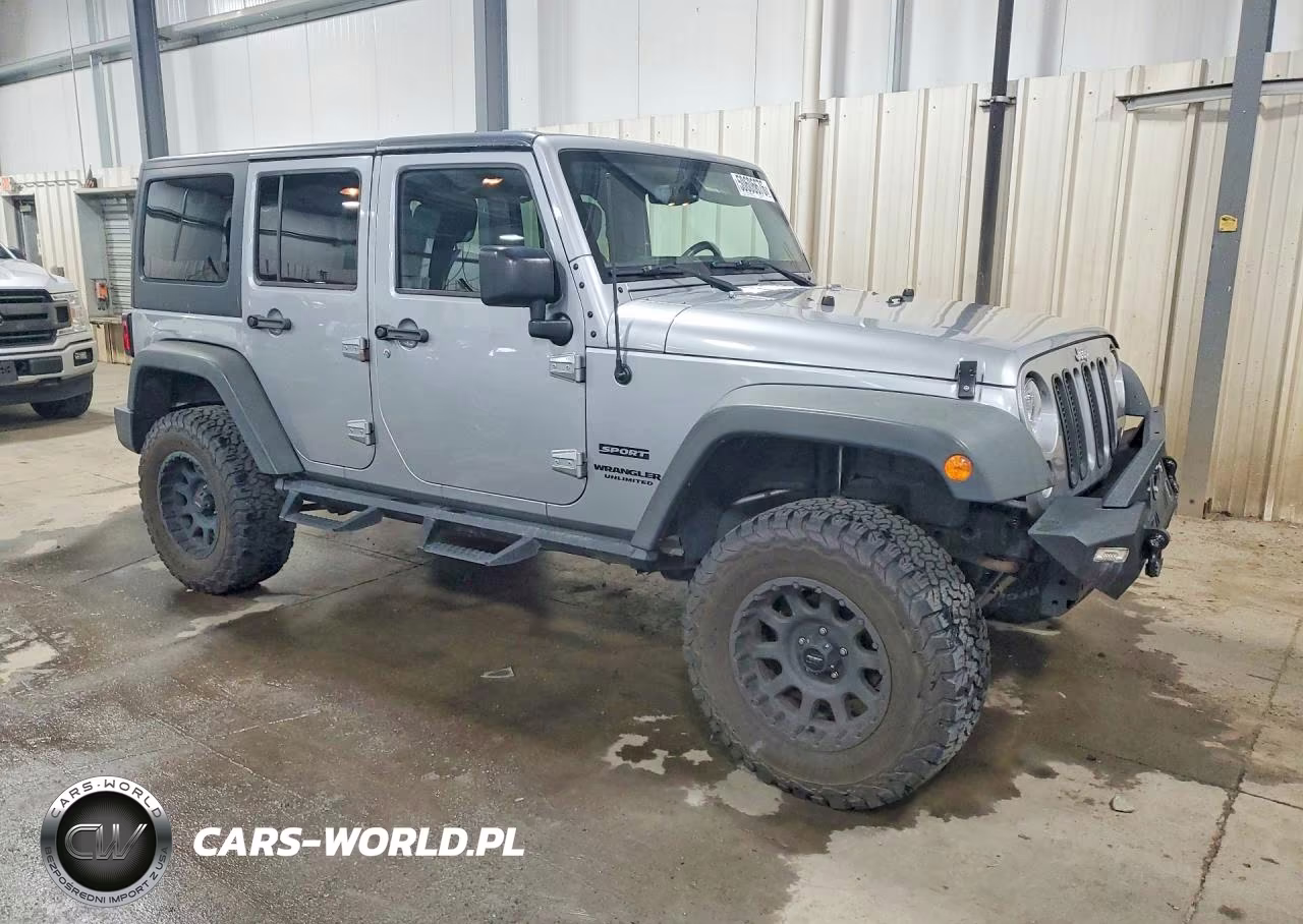 2015 Jeep Wrangler Unlimited Sport VIN:1C4HJWDG9FL664900 - 4