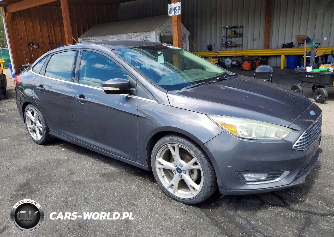 2015 Ford Focus Titanium VIN:1FADP3J26FL364788 - 4