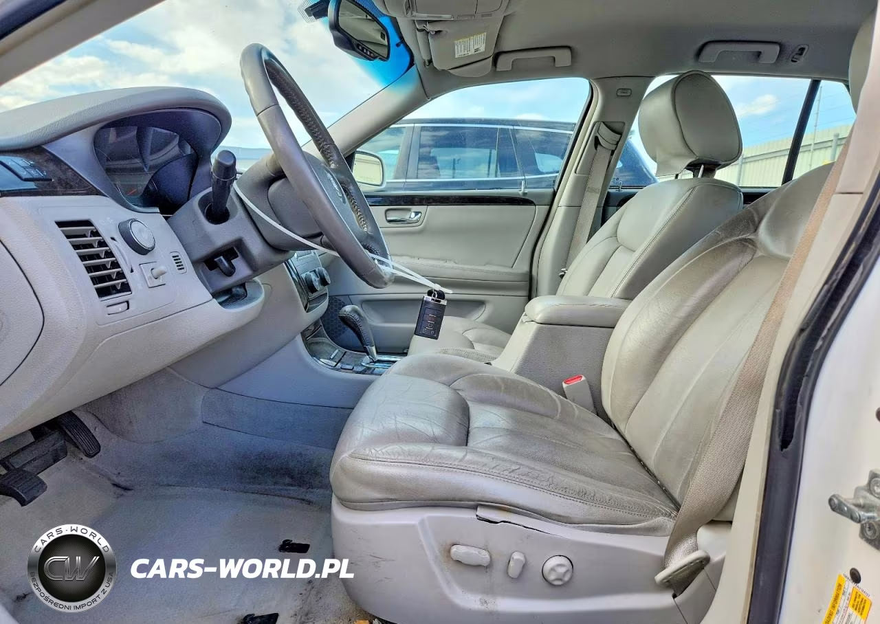 2010 Cadillac Dts VIN:1G6KA5EYXAU124727 - 7