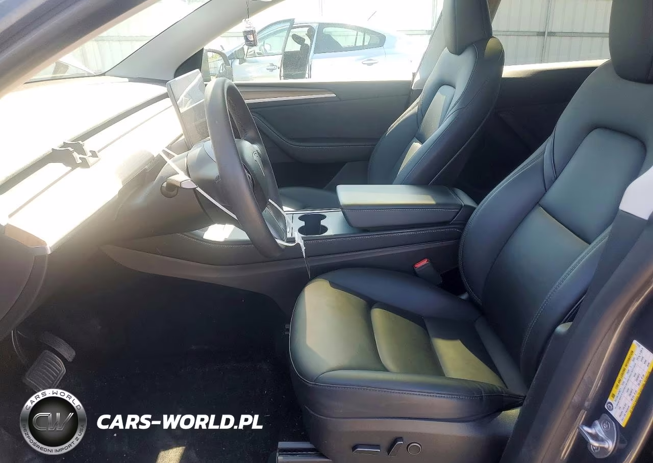 2023 Tesla Model Y VIN:7SAYGDEE4PA171310 - 7
