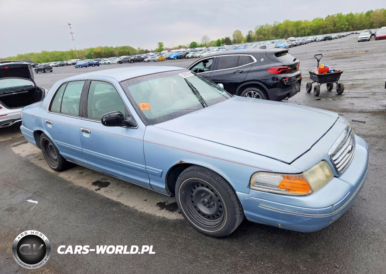 2000 Ford Crown Victoria VIN:2FAFP73W7YX135963 - 4