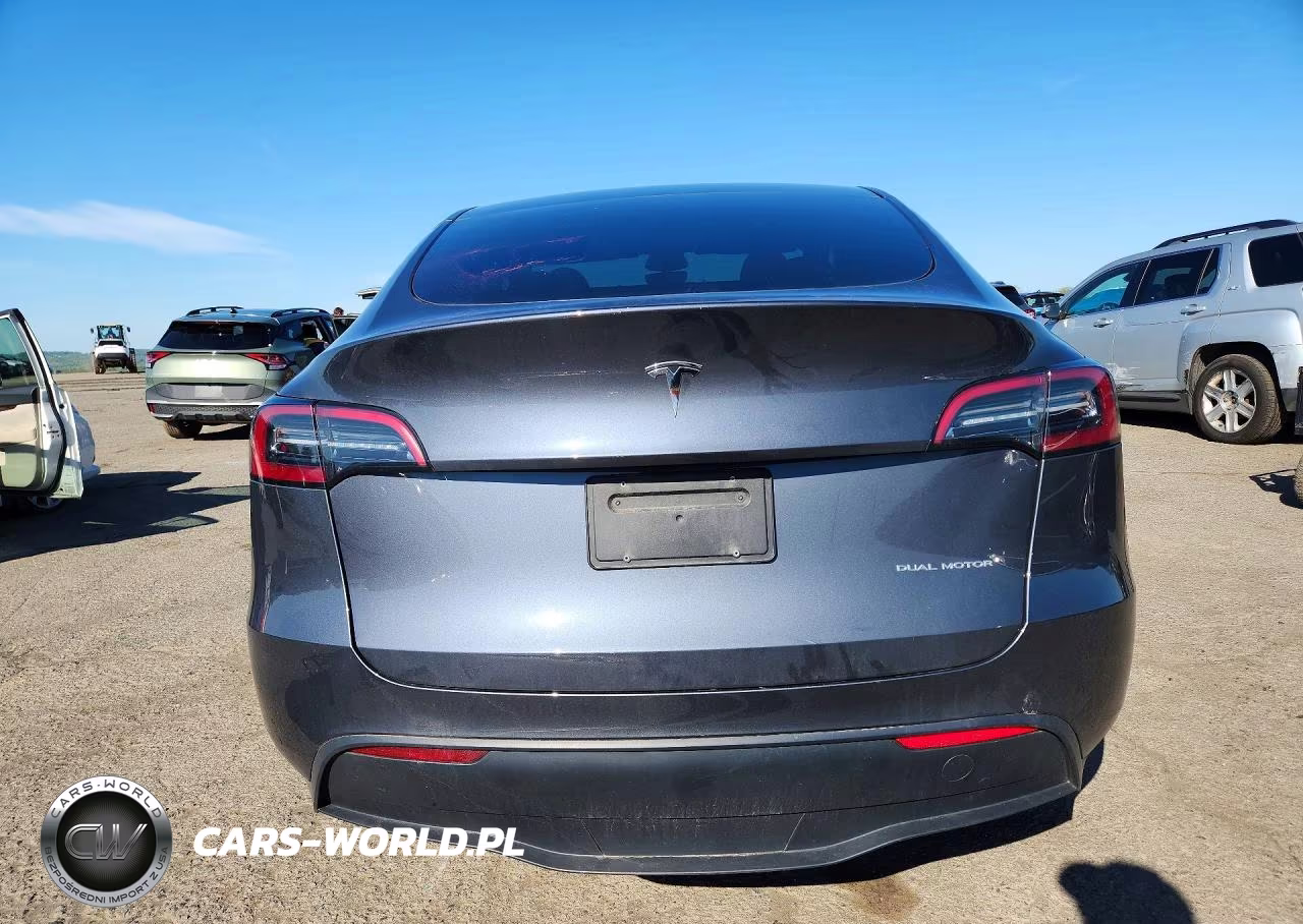2023 Tesla Model Y VIN:7SAYGDEE4PF832210 - 6
