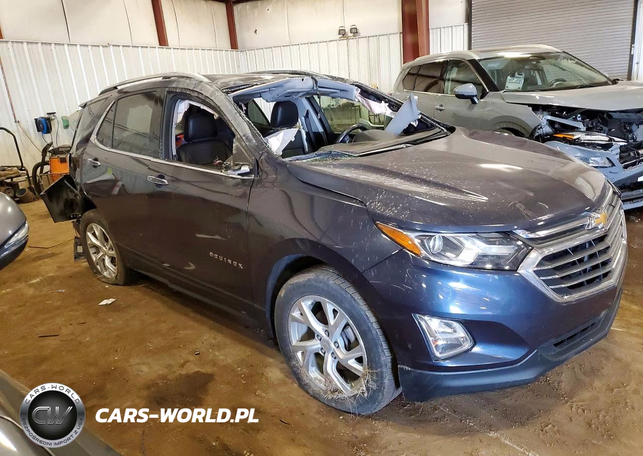 2018 Chevrolet Equinox Premier VIN:3GNAXVEV8JS562411 - 4