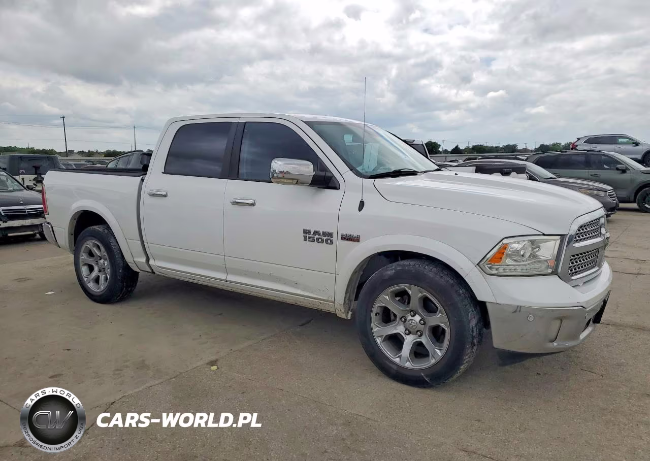2015 Ram 1500 Laramie VIN:1C6RR6NT0FS761876 - 4