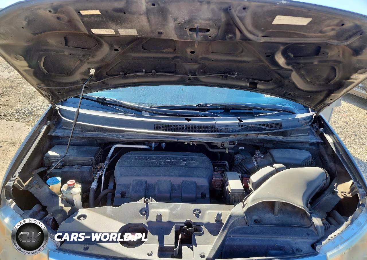 2012 Honda Odyssey Touring VIN:5FNRL5H99CB120397 - 12