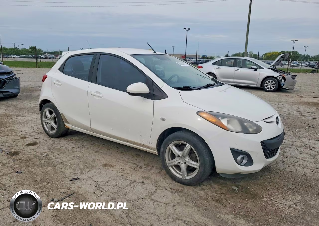 2011 Mazda Mazda 2 VIN:JM1DE1HYXB0109930 - 4